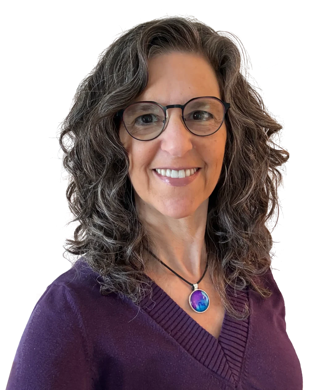 Headshot of Dena Samuels in a purple shirt, smiling at the camera
