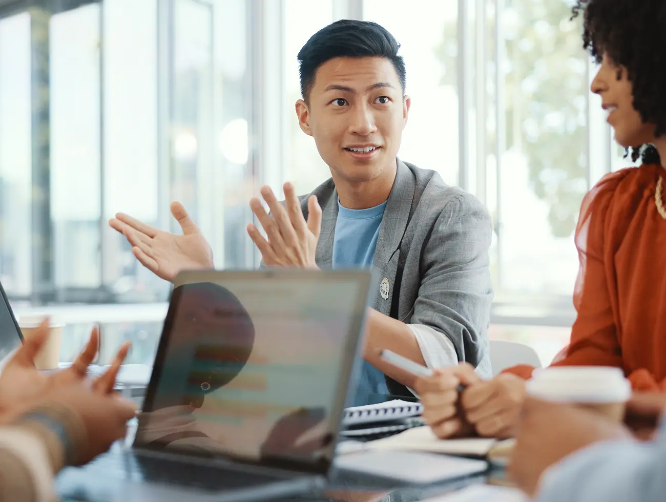 Several people discuss business-related objectives excitedly and intentionally